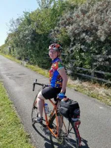 A Cyclist on the Farlington Marshes Path